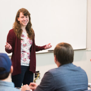 Girl smiling and explaining 