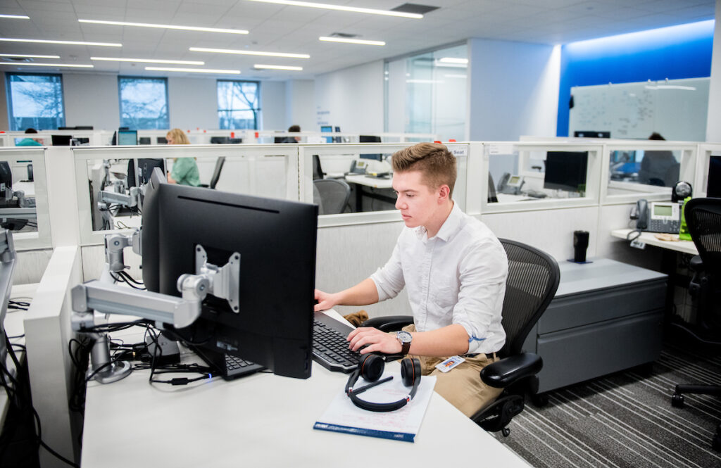 MBA student working in person at job.