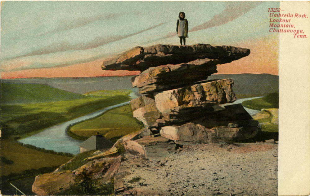 A girl stands on Umbrella Rock, a rock formation on Lookout Mountain, Tennessee.