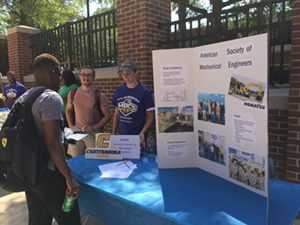 Members from the UTC American Society of Mechanical Engineers Student Chapter speak to new students