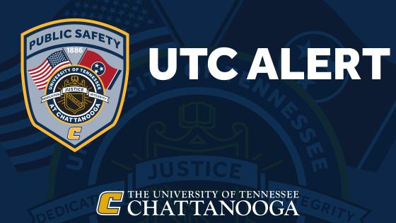 Dark blue background, UTC safety logo in the shape of police badge. UTC alert written beside logo in white letters.