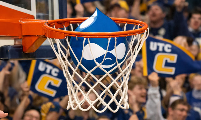 Slam dunk drupal logo with UTC penants in the background.