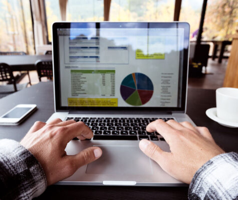 Person working on excel spreadsheet