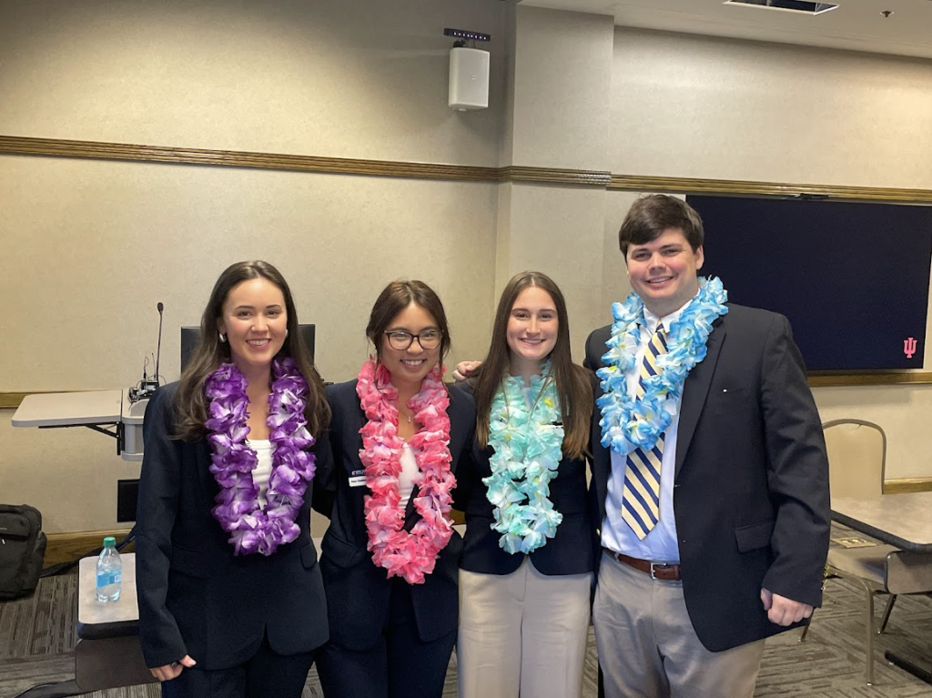 The team moments before their second presentation, pitching “Aloha Roots,” a quick-service restaurant concept for convenience stores.