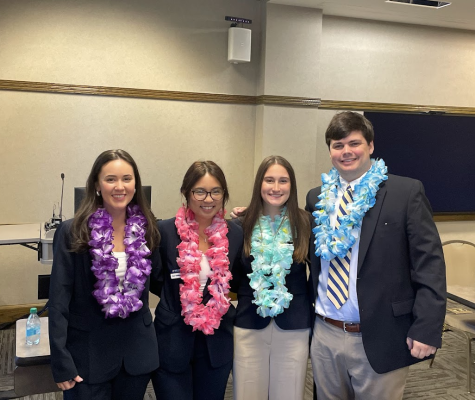 The team moments before their second presentation, pitching “Aloha Roots,” a quick-service restaurant concept for convenience stores.