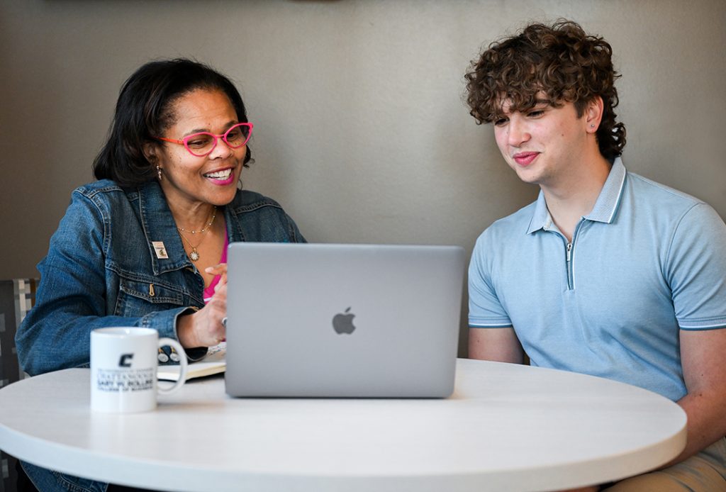 Student and advisor working together