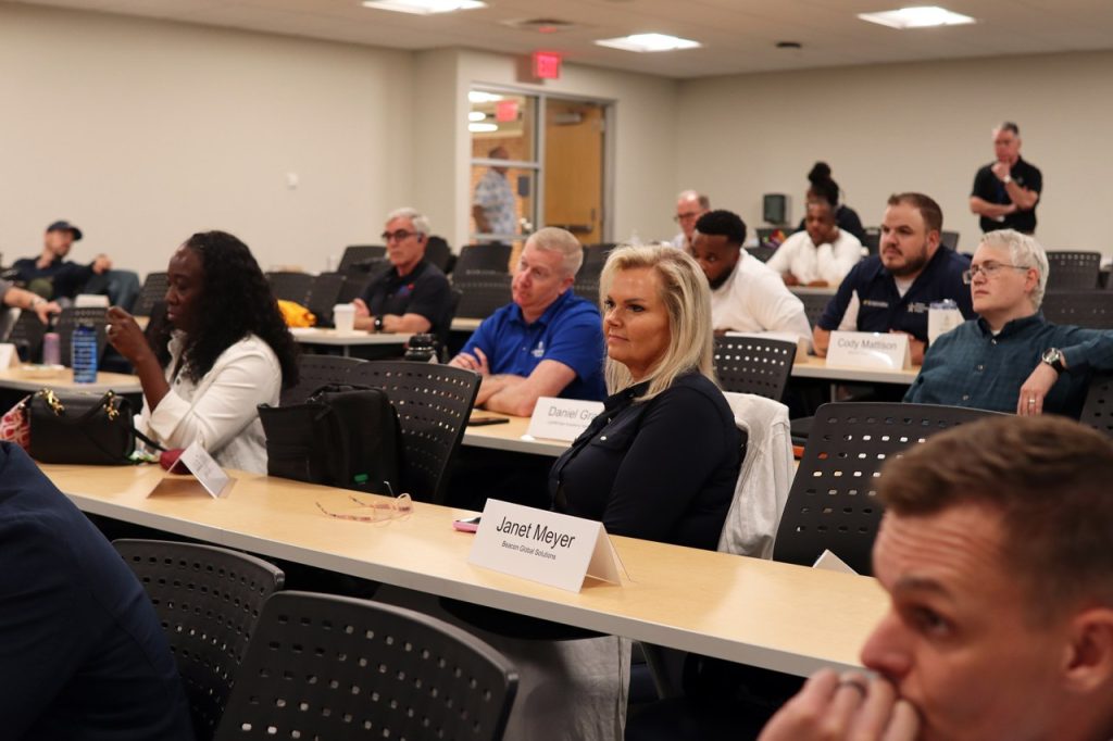 Woman sitting in classroom lecture