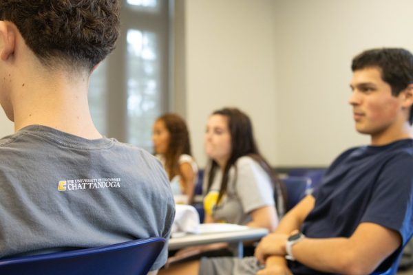 Freshman student sit in a classroom at RCOB.