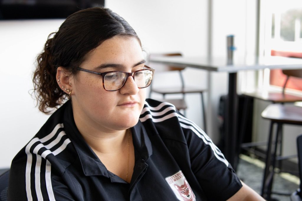 A close up of Maia Pentecost as she works at the Red Wolves soccer stadium.