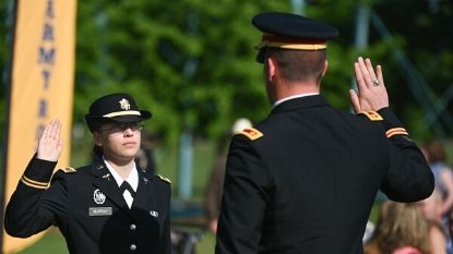 woman being sworn into the army