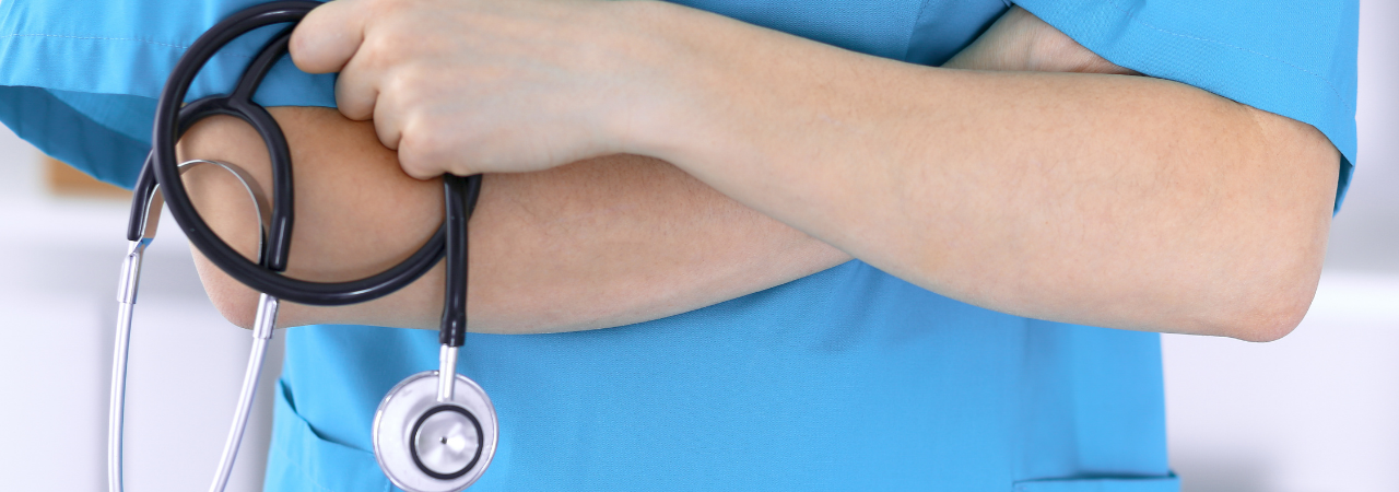 medical assistant holding stethoscope