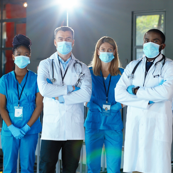 Team of medical professionals wearing masks