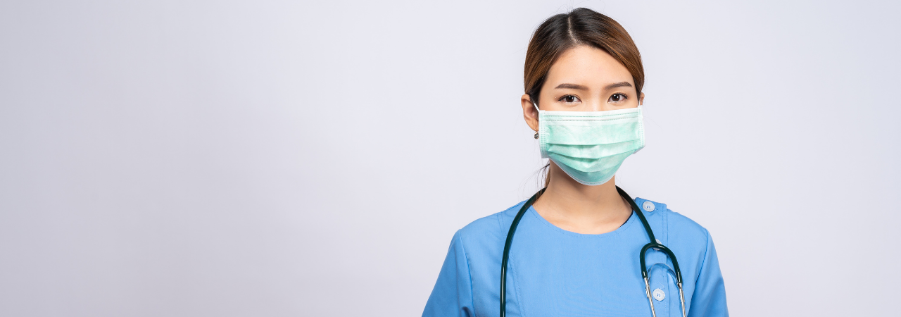 Female Asian nurse wearing a mask