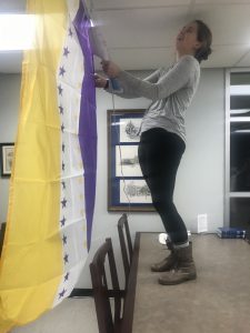 Some of the weird stuff you do in archives- steaming a flag for a suffrage exhibit!