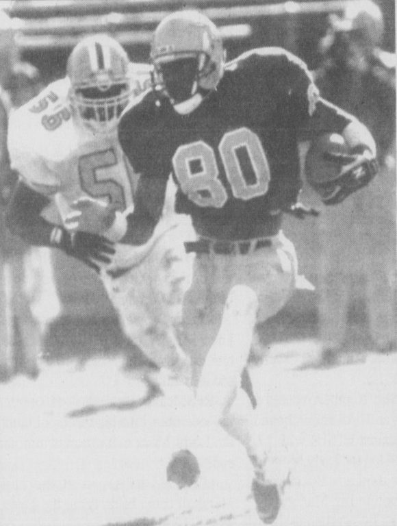Owens running the ball during the 1995 season.