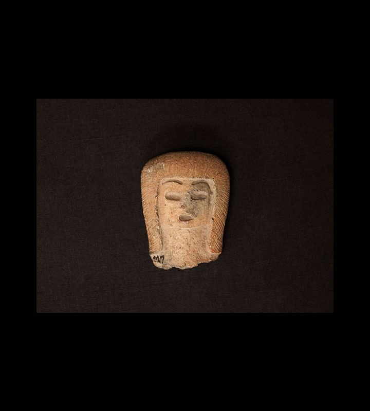 Pre-Columbian solid figure depicting a human head. Courtesy of the University of Tennessee at Chattanooga Special Collections.