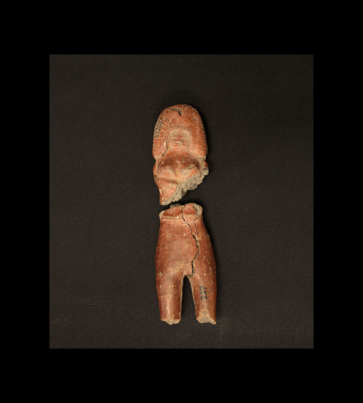 Small pre-Columbian ceramic figurine depicting a woman with a large headdress compared to the body. Courtesy of the University of Tennessee at Chattanooga Special Collections.