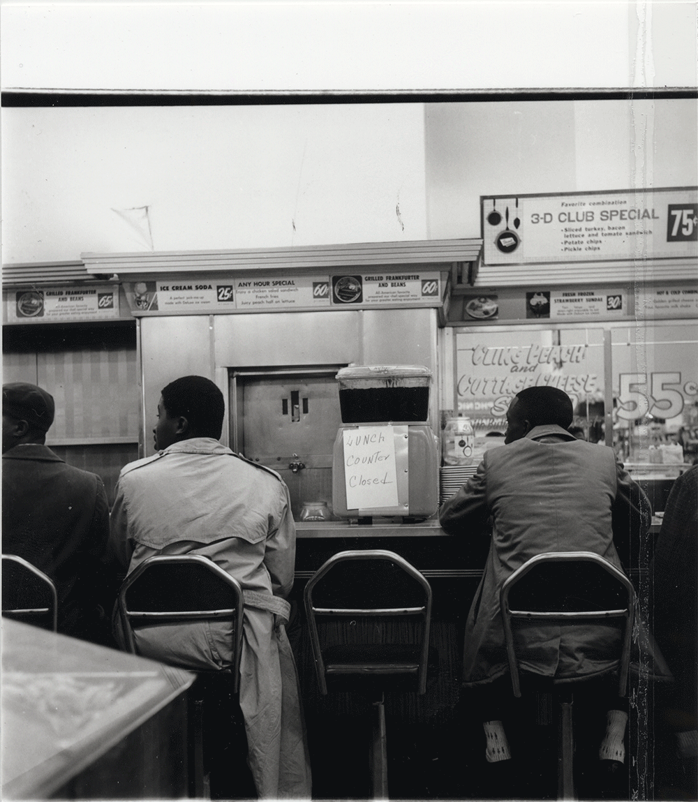 Black and white photograph of high school students participating in a sit-in at a lunch counter in downtown Chattanooga in February 1960.